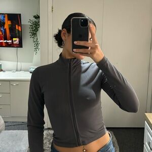 Tna butter zip up